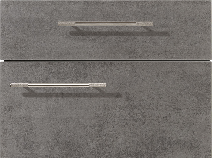 Moderne Betonoptik mit strukturierter Oberfläche und klaren Metallgriffen – puristisch und urban zugleich.